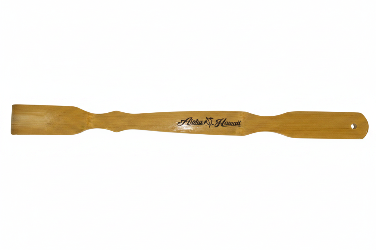 Wooden paddle with 'Alaska & Hawaii' branding on a white background