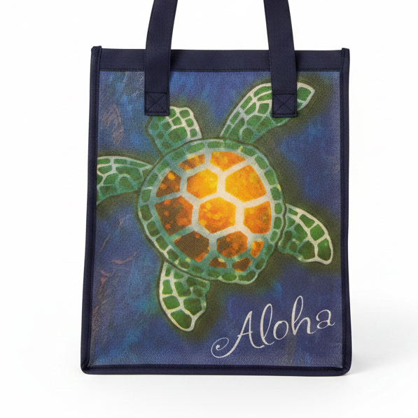 Tote bag with a turtle design and 'Aloha' text on a blue background