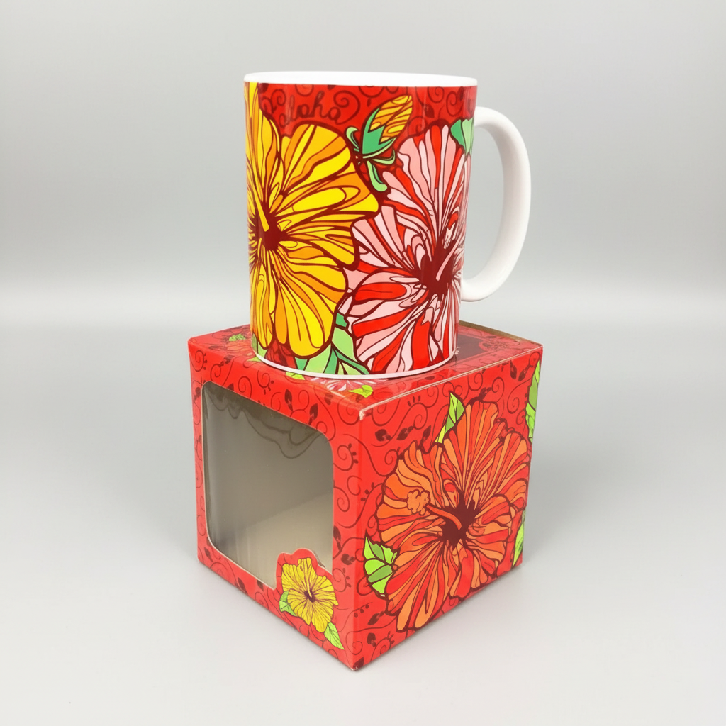 Colorful mug with floral design in a matching box on a white background