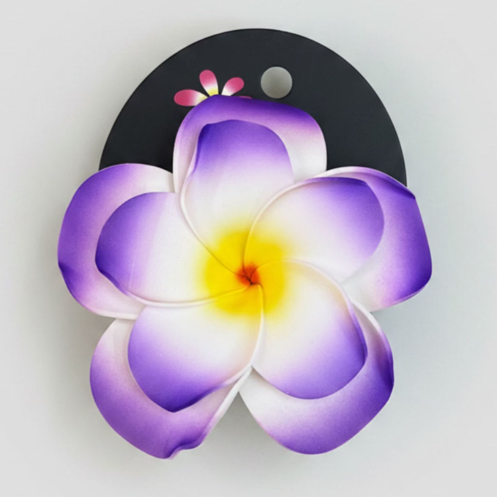 Floral design on a black background against an white backdrop